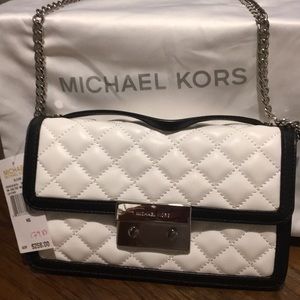 Black and white Michael Kors purse